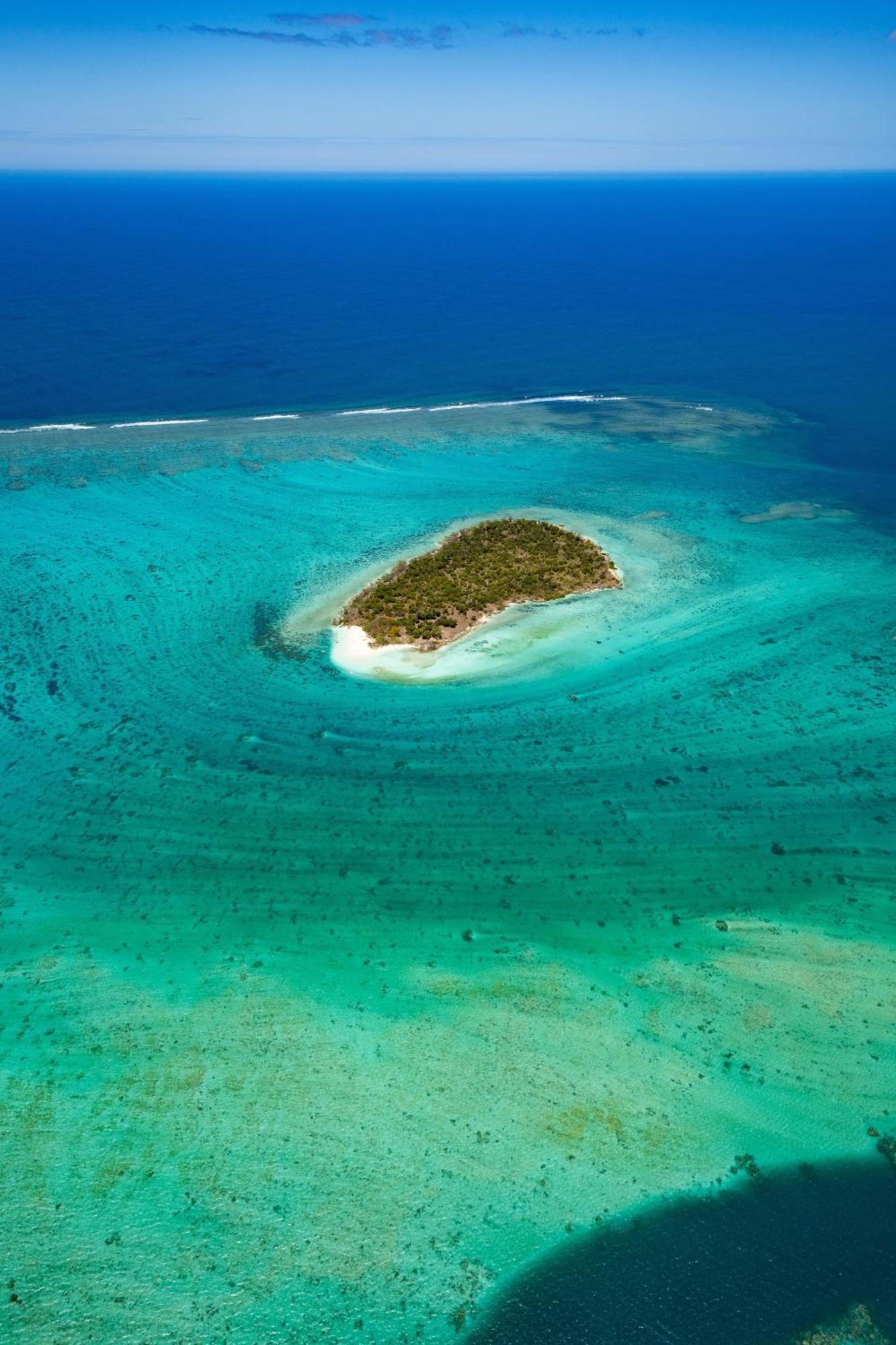 Sheraton New Caledonia Deva Spa & Golf Resort Bourail Exterior photo Aerial view of the island